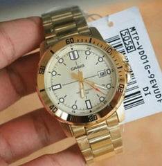 reloj caballero dorado con calendario