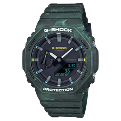 G-shock Referencia: ga-2100fr-3adrGenero: Hombre Composición: analogo, digital, cronometro, temporizador, alarma, calendario Materiales: resina Color: verde y negro Impermeabilidad: 20 atm Cristal: mineral Producto con garantía de 1 año en funcionamiento.RecomendacionesReloj con resistencia al agua para sumergirse. No manipular los botones cuando se esté en contacto con el agua.