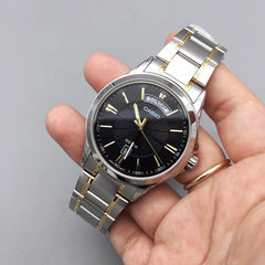 reloj casio Hombre MTP-1381G-1AVDF en acero inoxidable bicolor con calendario y semanario , esfera negra 